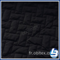 Tissu de mémoire en polyester obl20-Q-043 pour couche de quilting